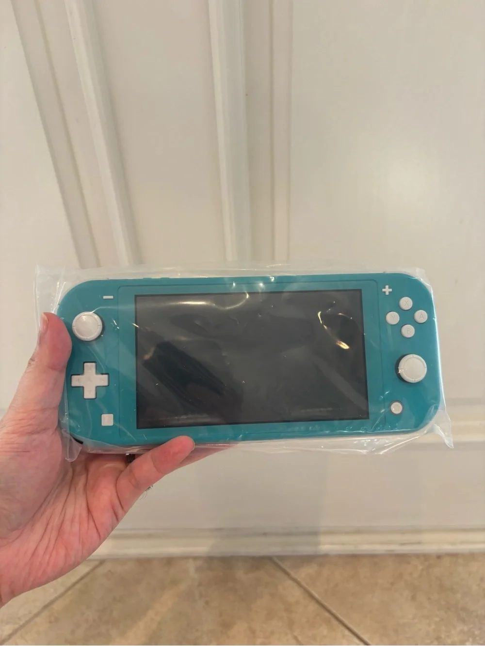 Open Box Nintendo Switch Lite - Turquoise.